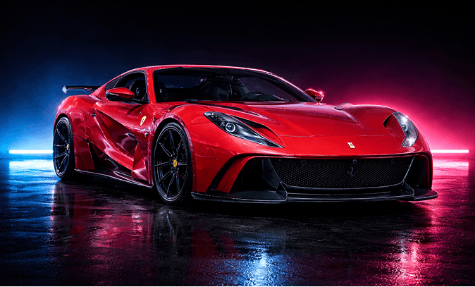 Red Ferrari sports car in a dark studio, shown front three-quarter view with neon blue and pink backlighting and a low, aggressive aero design.